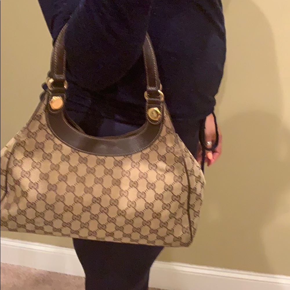 Authentic Gucci Bag wallet is a bonus!